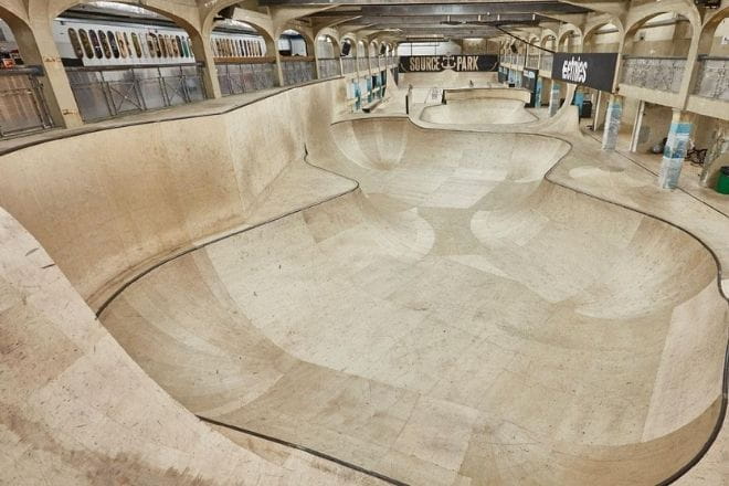 a person riding a skateboard up the side of a ramp