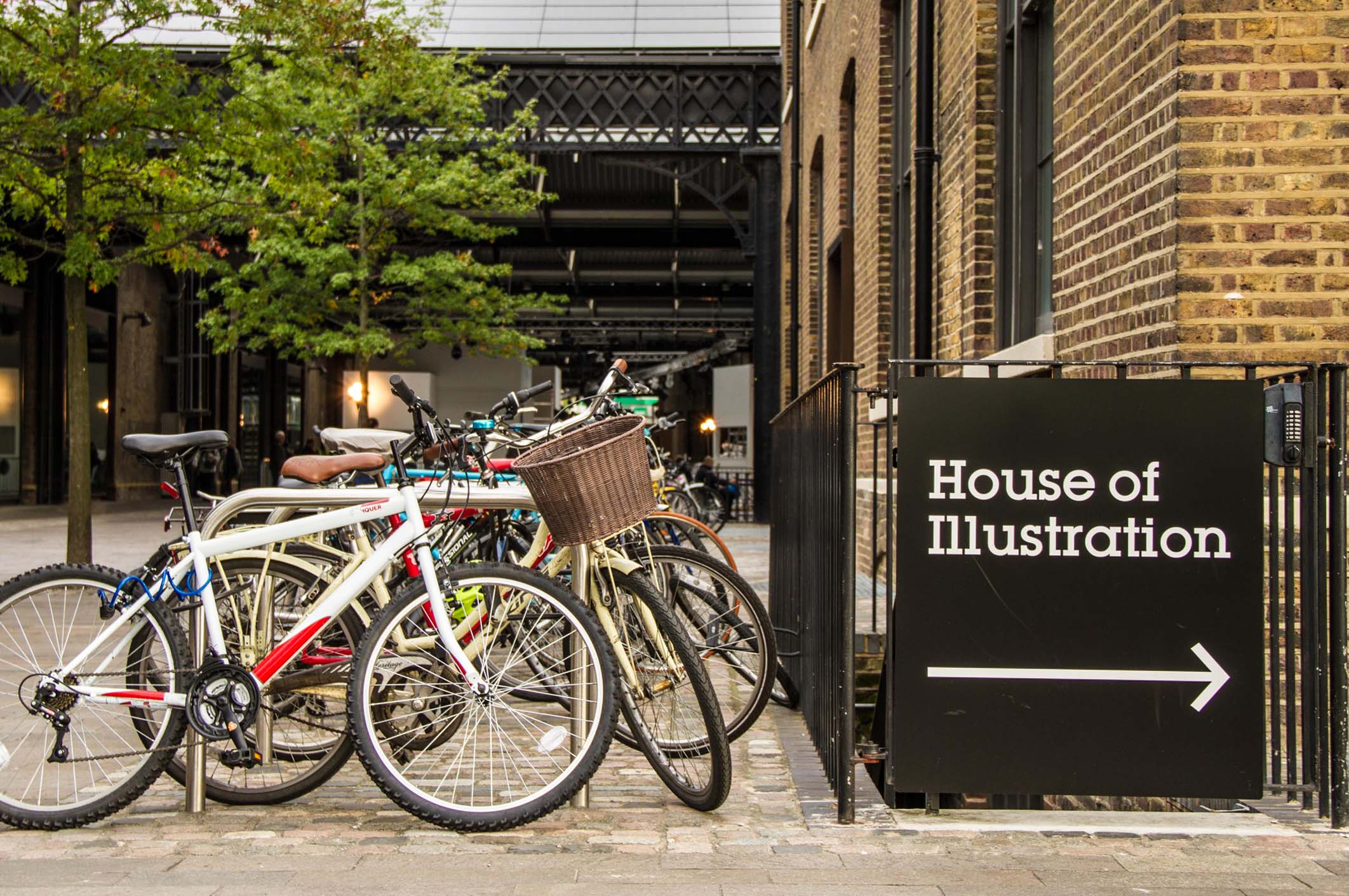 a bicycle parked on the side of a building