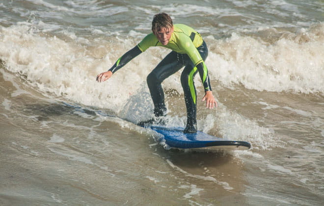 Young boy surfing
