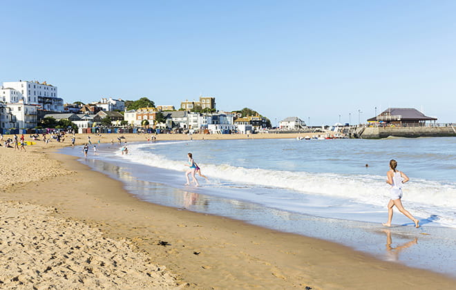 People running in the sea