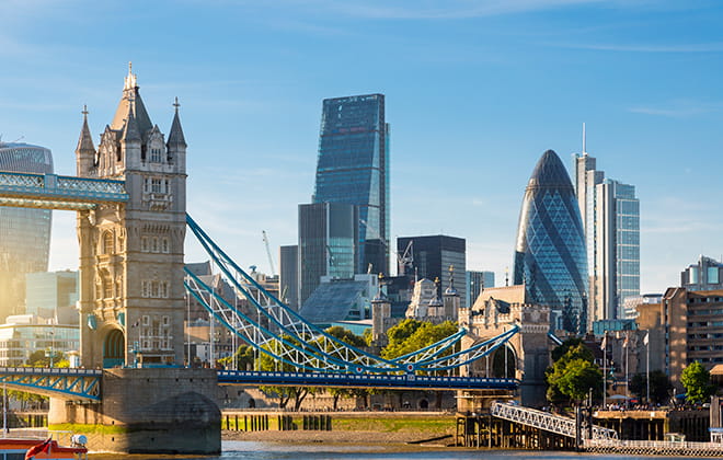 a bridge over a river in a city