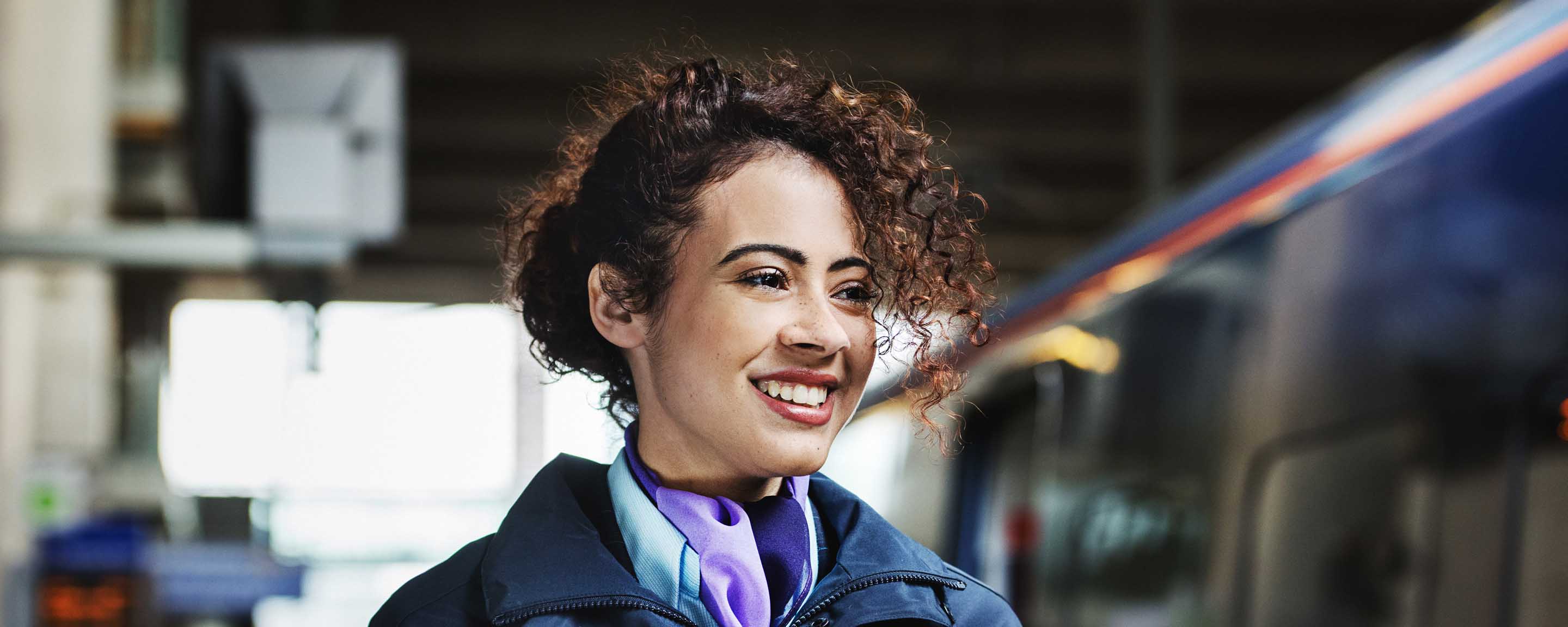 Woman next to train