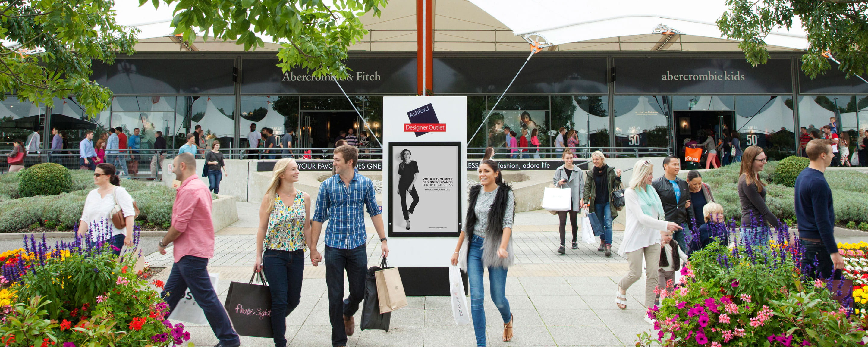 a group of people walking down the street