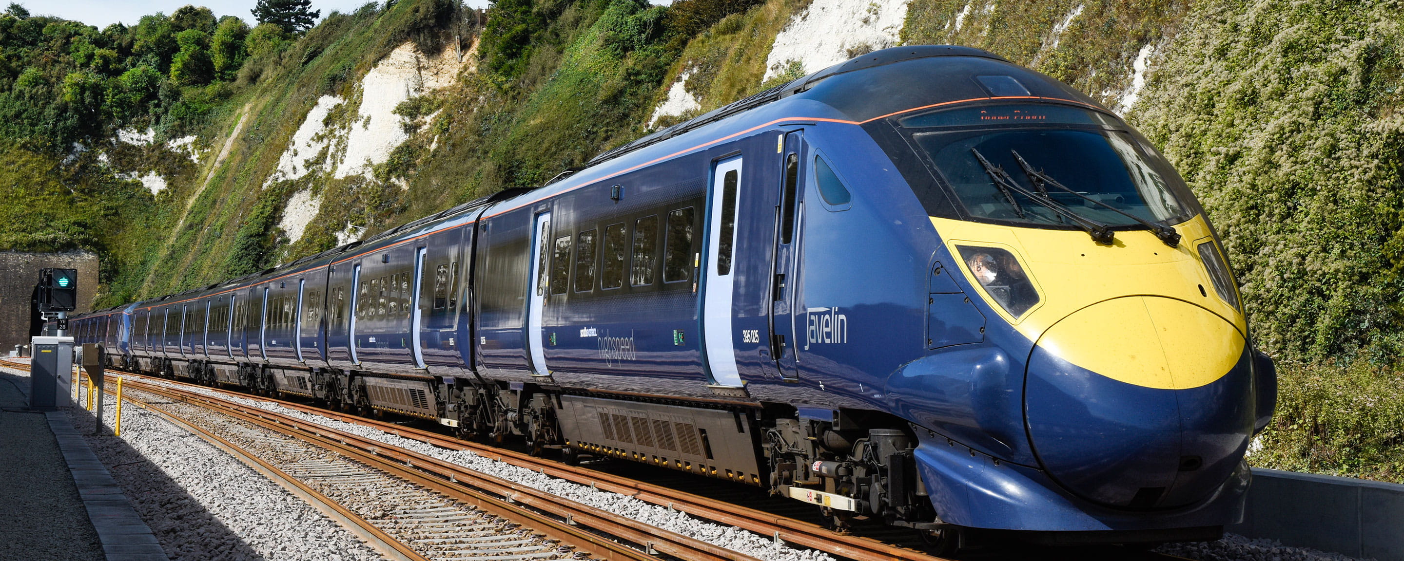 High speed train coming out of tunnel