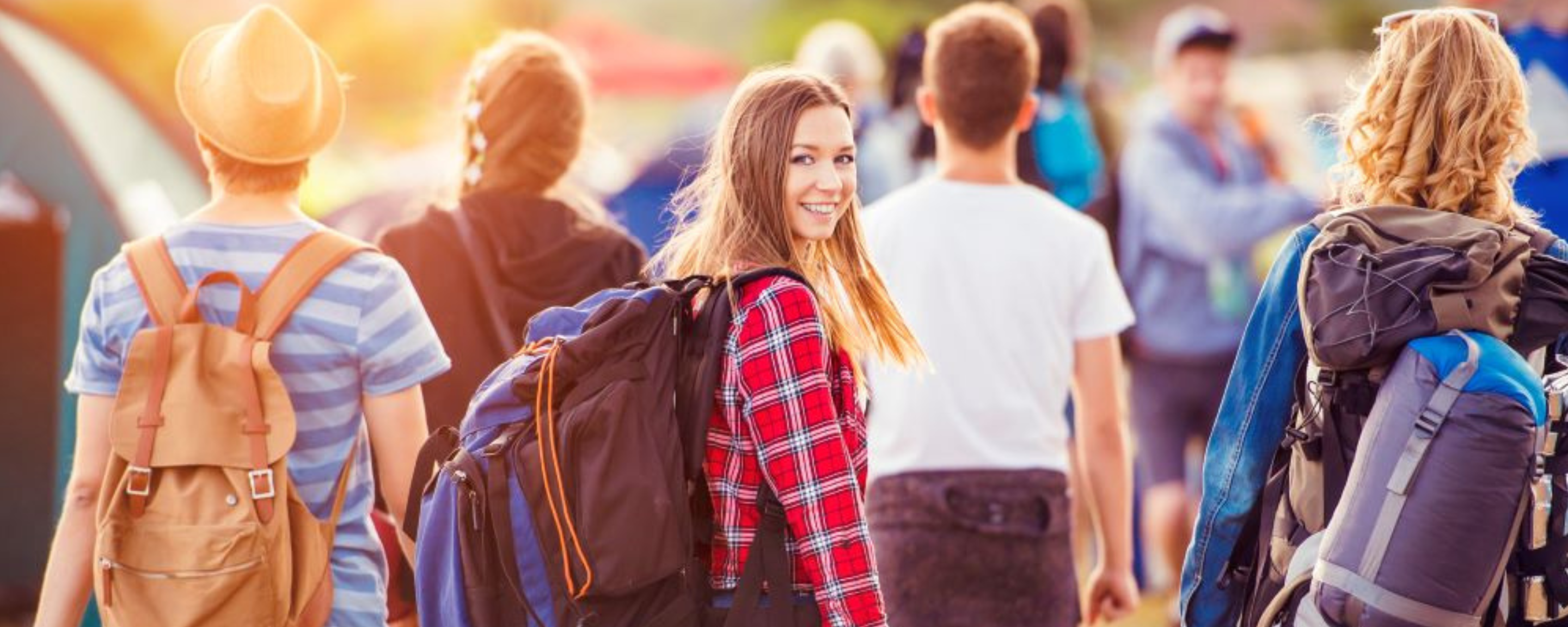 Teenagers with backpacks on