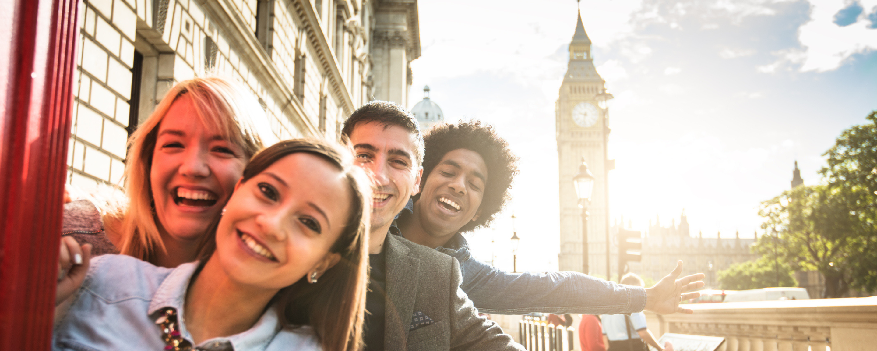 Young adults posing in front of Big Ben