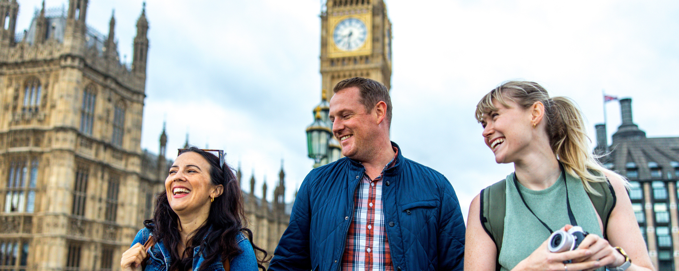 A family outside the Houses of Parliament