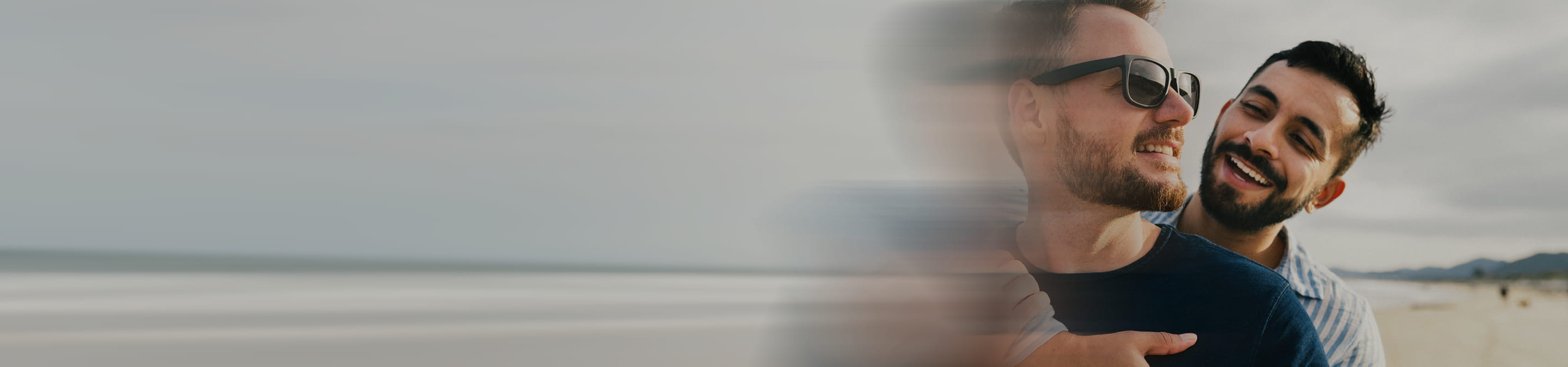image on the right of a couple on the beach