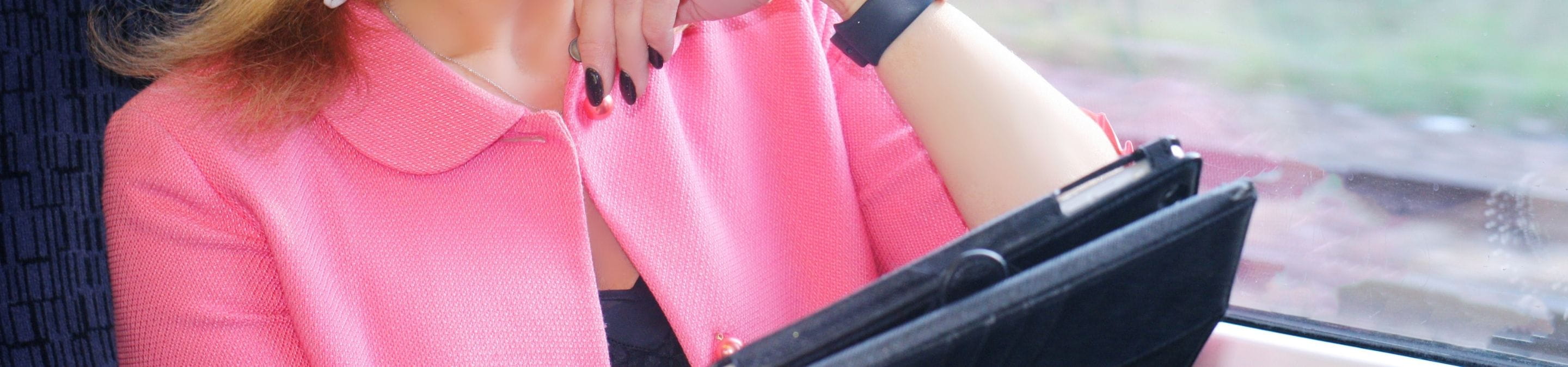 a close up of a person holding a piece of luggage