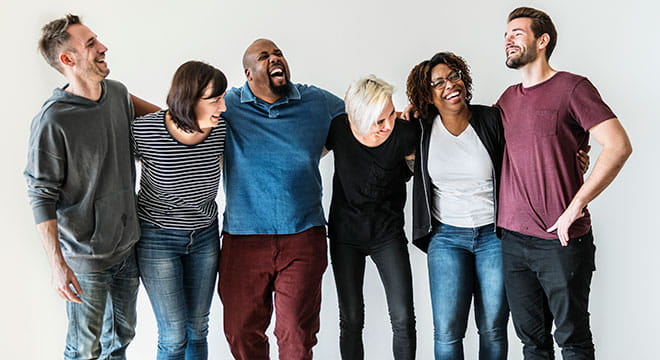 a group of people posing for the camera