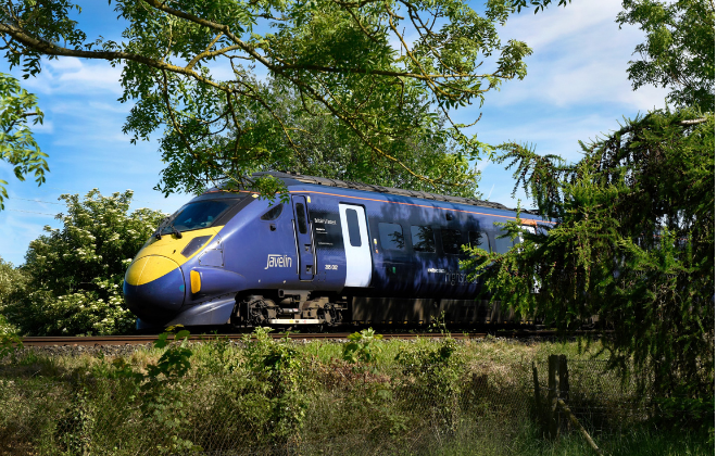 Train moving through countryside