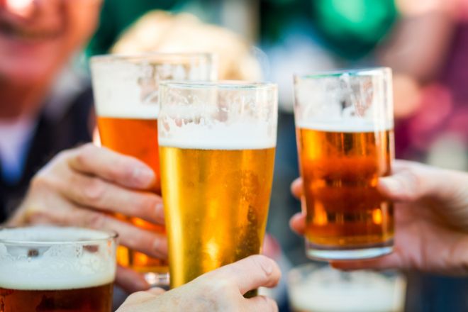 people drinking beer at a festival