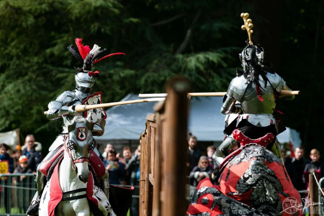 Knights on horseback jousting