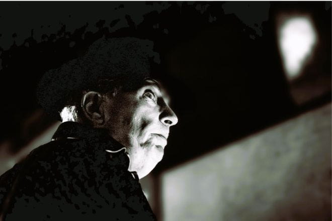 Man looking spooky in black and white shadow