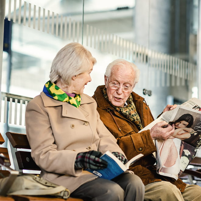 Elderly couple on bench