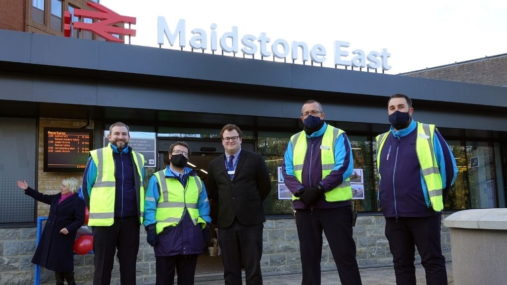 Southeastern staff in uniform stood in front of the entrance to Maidstone East station.